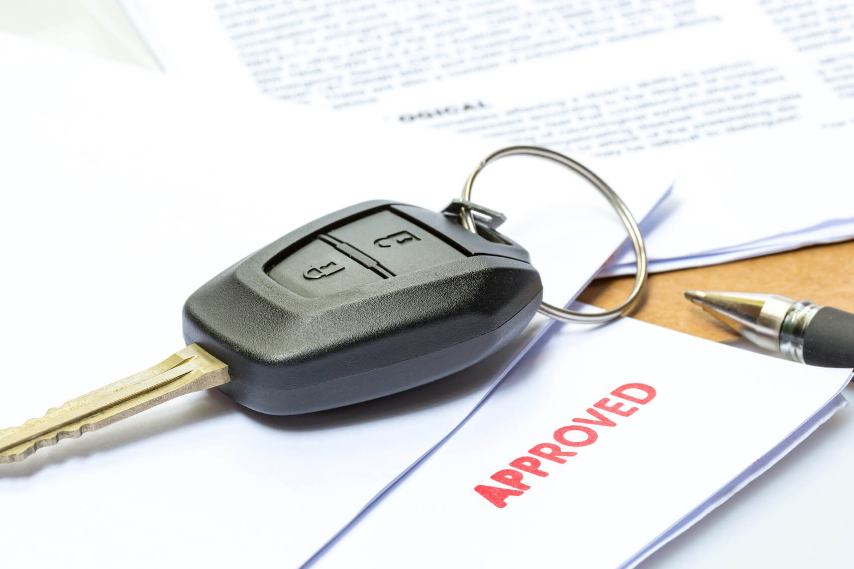Car Keys on Approved Financing Paper